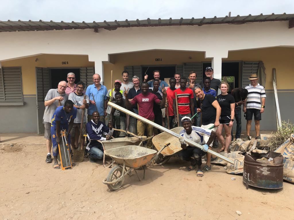 Retreat participants and villagers at the school